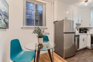 Light kitchen opens to the dining table