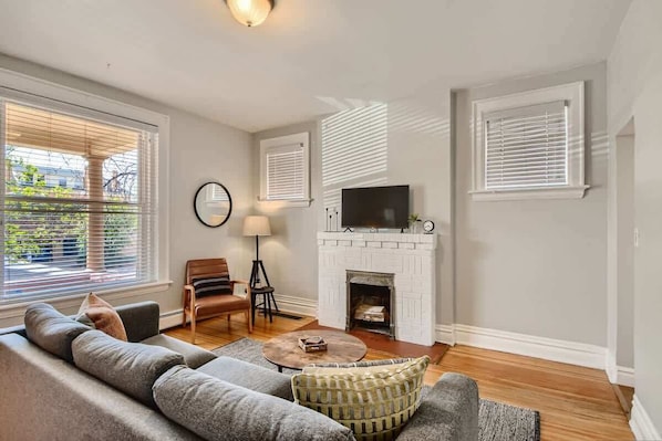 Spacious living room with tons of natural lighting