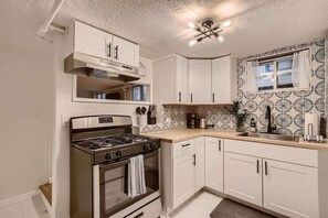 This spacious and newly renovated kitchen comes with a gas range 