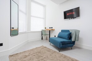 Room Features:

-1 x Double Bed
-1 x Sofa Bed
-Plugs in bedside table (direct USB plug available)
-Dedicated workspace
-Smart TV with Netflix
-Private mini fridge with freezer
-Open space with hangers for hanging clothes