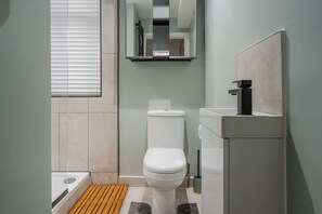 Full Bathroom:
- Sink
- Toilet
- Electric Shower