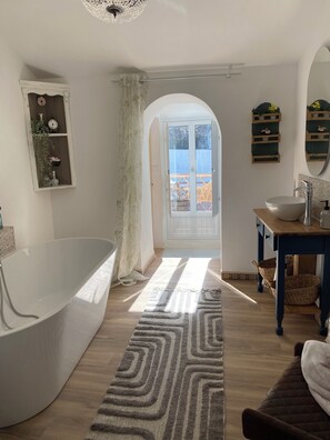 Bathroom with free standing bath , basin , and separate WC