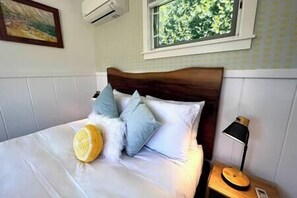Queen Bed with reading lights and built-in phone chargers