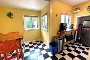 Freshly remodeled dining nook and kitchen provide ample space for meals and gathering.