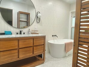 Spacious Bathroom with Tub and Shower
