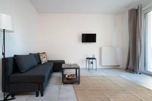 Living Room – Cozy Sofa & Smart TV for Your Comfort | Book Now with RENTUJEMY.COM