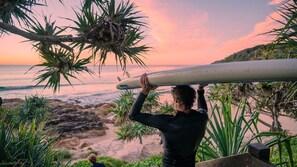 Sunrise surf? Yes please! And freshen up under our outdoor surf shower at the entrance to the apartment building.