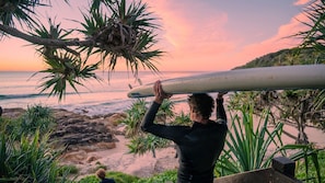 Sunrise surf? Yes please! And freshen up under our outdoor surf shower at the entrance to the apartment building.