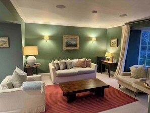 Large comfortable lounge with real fire and Sky TV