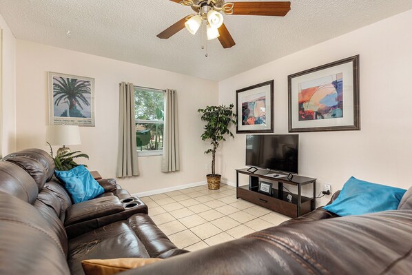 Private living room with a Roku TV, comfy couches, and strong wifi!