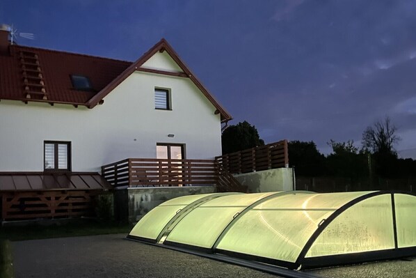 Outdoor swimming pool in the garden