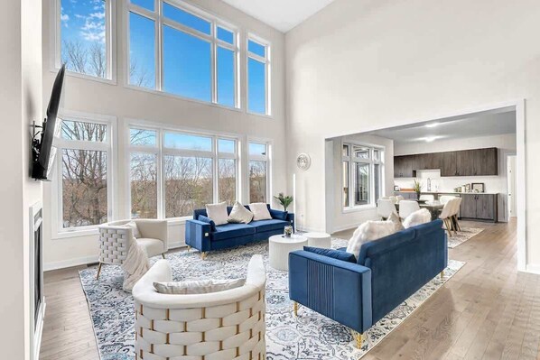 Gorgeous Great Room overlooking 180 degree panaromic views of the lake below from September to June.