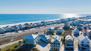 Nestled across the street from the beach and directly on the lagoon