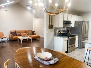 DINE: Enjoy a home-cooked meal in the open dining space, perfect for reconnecting.