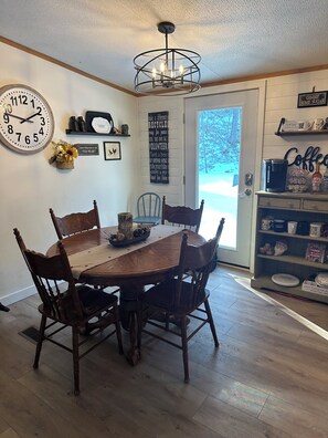 Dining table opens to accommodate 6
