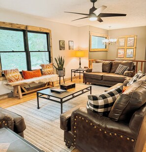 The living room is just off the kitchen in this open floor plan.