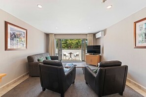 Middle floor - lounge area, and outside balcony