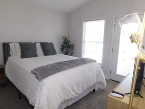Queen bedroom, upstairs with deck access