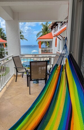 Lounge in a hammock on the balcony and watch the boats go by!