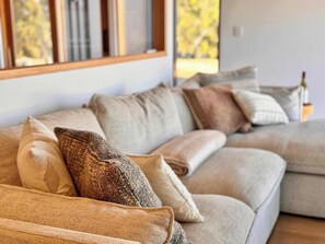 Plush modular lounge to lounge in after your day’s outings