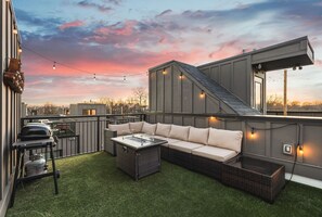 Unit #1: Beautiful views on your private rooftop deck with lots of seating, a gas fireplace and BBQ grill.