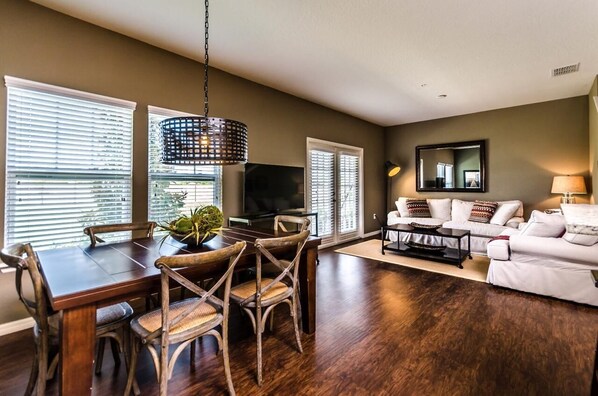 Relax in this spacious living area! Smart TV & comfy seating await.