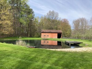 Your own private pond, organically treated, safe for swimming.  Kayaks and paddleboat provided for you to enjoy, at your leisure,  all to yourselves! Original barn (still in progress as an additional play space) provides a beautiful back drop to the simple pleasures of nature. 