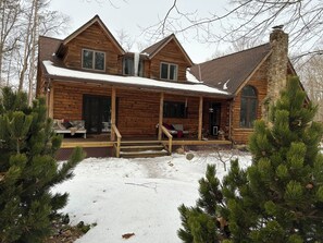 The front porch, DURING the RENOVATION.  We've got a great front porch swing, and furniture to bring this front porch to life overlooking the courtyard (covered with snow during our renovation this winter/spring)