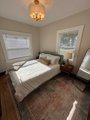 Queen bedroom with memory foam mattress.
