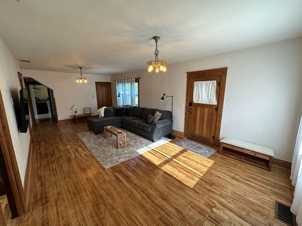 Large living room with loads of natural light! 