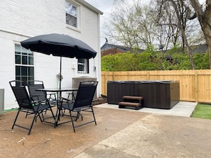 Hot tub, Grill and Outdoor Dining Table.