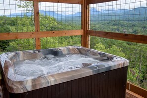 Unwind in the private hot tub 