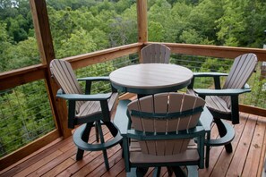 Wrap around deck with stunning view, hot tub, and outdoor seating 