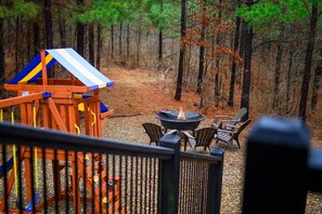 The back yard offers loads of space for relaxation & play
