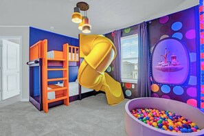 Kids Bedroom with Bunkbed Slide and Ball Pit