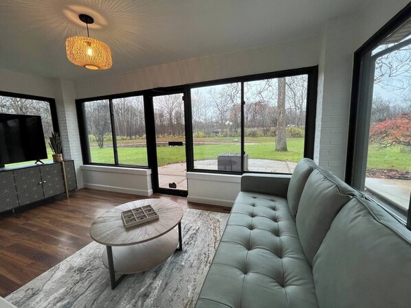 Comfy sunroom to relax, play games, or watch your favorite show.