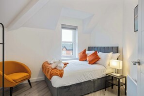 Stylish and modern bedroom with comfy hotel mattress