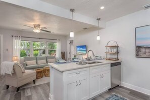 Full size kitchen that includes a folded dining table that seats 6 should you prefer eating inside.