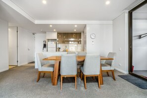 Gather around our elegant dining table, perfect for enjoying meals and making memories. The stylish design and ample space create a welcoming setting for family dinners, entertaining guests, or simply savoring your favorite dishes.