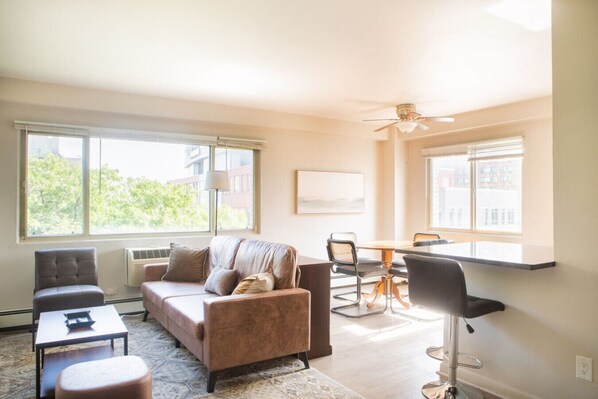 Spacious living room with dedicated workspace