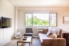 Spacious living room with dedicated workspace