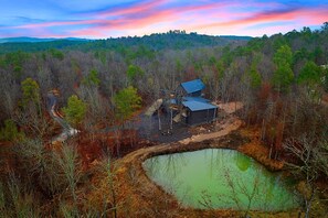 Redbud Landing is a luxurious 5 bedroom cabin with its own private pond