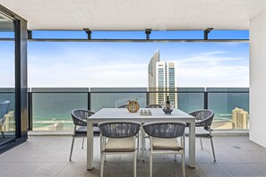 Enjoy your morning coffee in our spacious balcony overlooking the ocean 