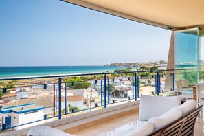 Expansive Ocean View Balcony with Outdoor Seating
