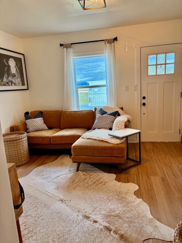 Living area with brand new furniture. A view of the Snohomish Valley.