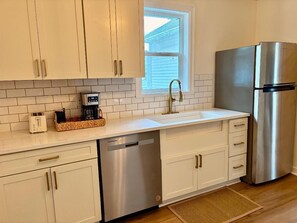 All new appliances, and stocked cupboards with all cookware you need. Dishes etc