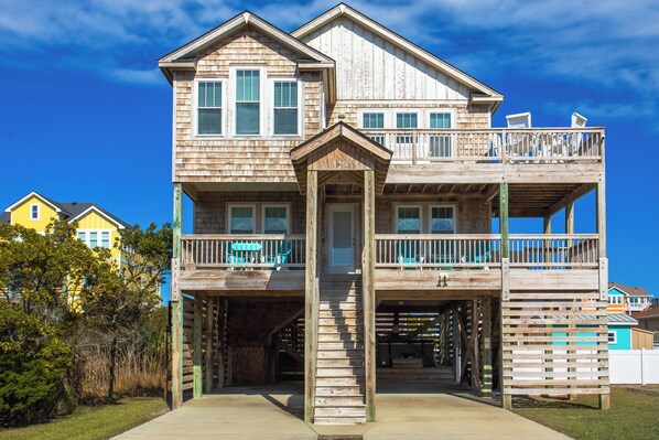 Welcome to Siren's Serenade, a stunning 4-bedroom, 3.5-bathroom vacation retreat nestled just three lots from the beach.