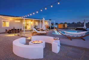 Gather around the fire pit. 