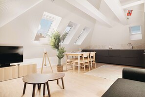 Open concept living at its finest.  This loft seamlessly blends dining, living, and kitchen areas.