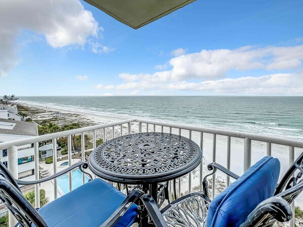 Sip your morning coffee or enjoy a sunset dinner at our cozy balcony table for two, complete with stunning beachfront views.